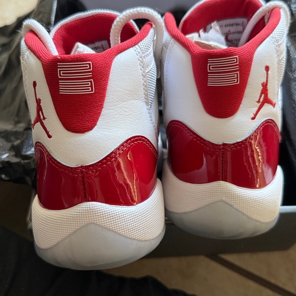 Air Jordan 11 Retro White and Red Sneakers - Picture 5 of 6